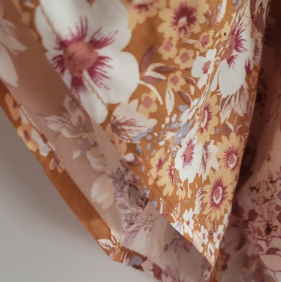 Boho floral top. Bell sleeves, crossover front, cool and breezy. - Picture 4 of 5